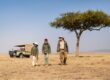 une famille en safari dans la savane africaine